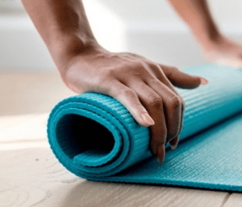 rolling a yoga mat