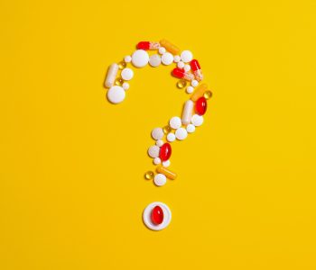 medications in shape of question mark
